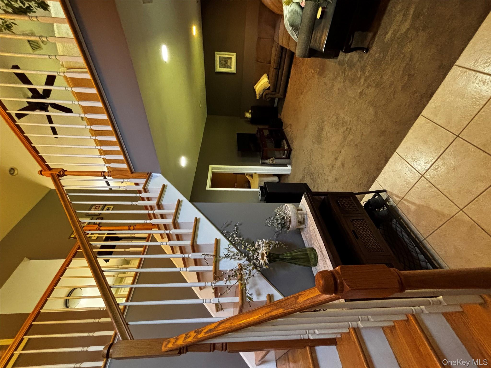 62 Triangle Of Clearwater Road Highland, NY 12528 - Photo 26 of 46 Stairs with carpet floors and tile patterned floors