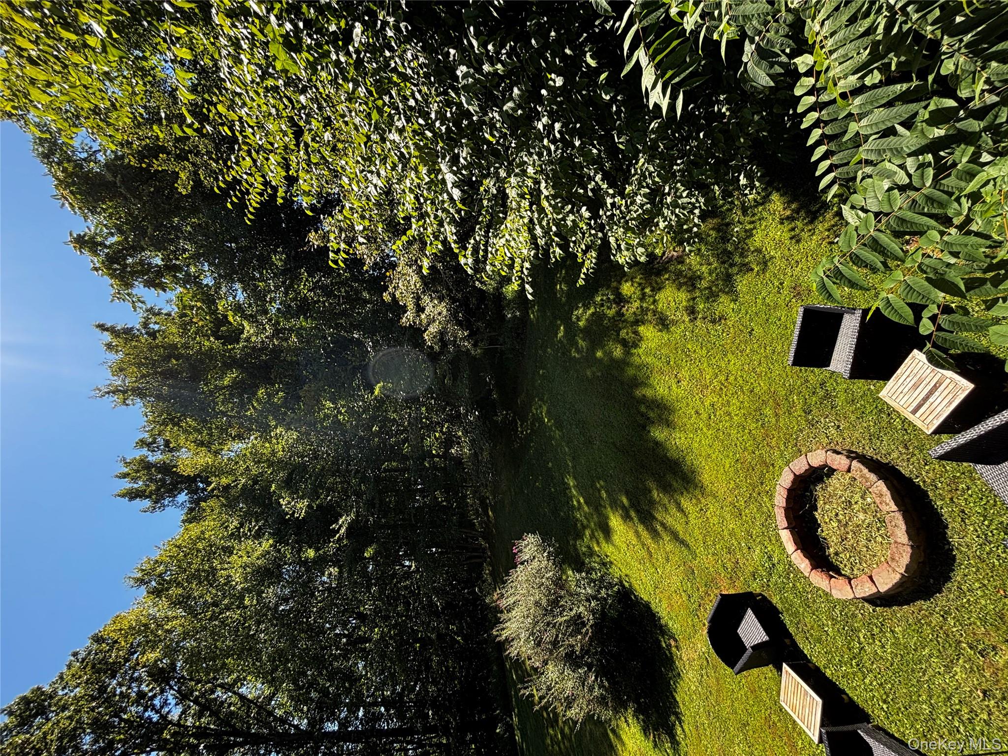 62 Triangle Of Clearwater Road Highland, NY 12528 - Photo 35 of 46 View of grassy yard with an outdoor fire pit