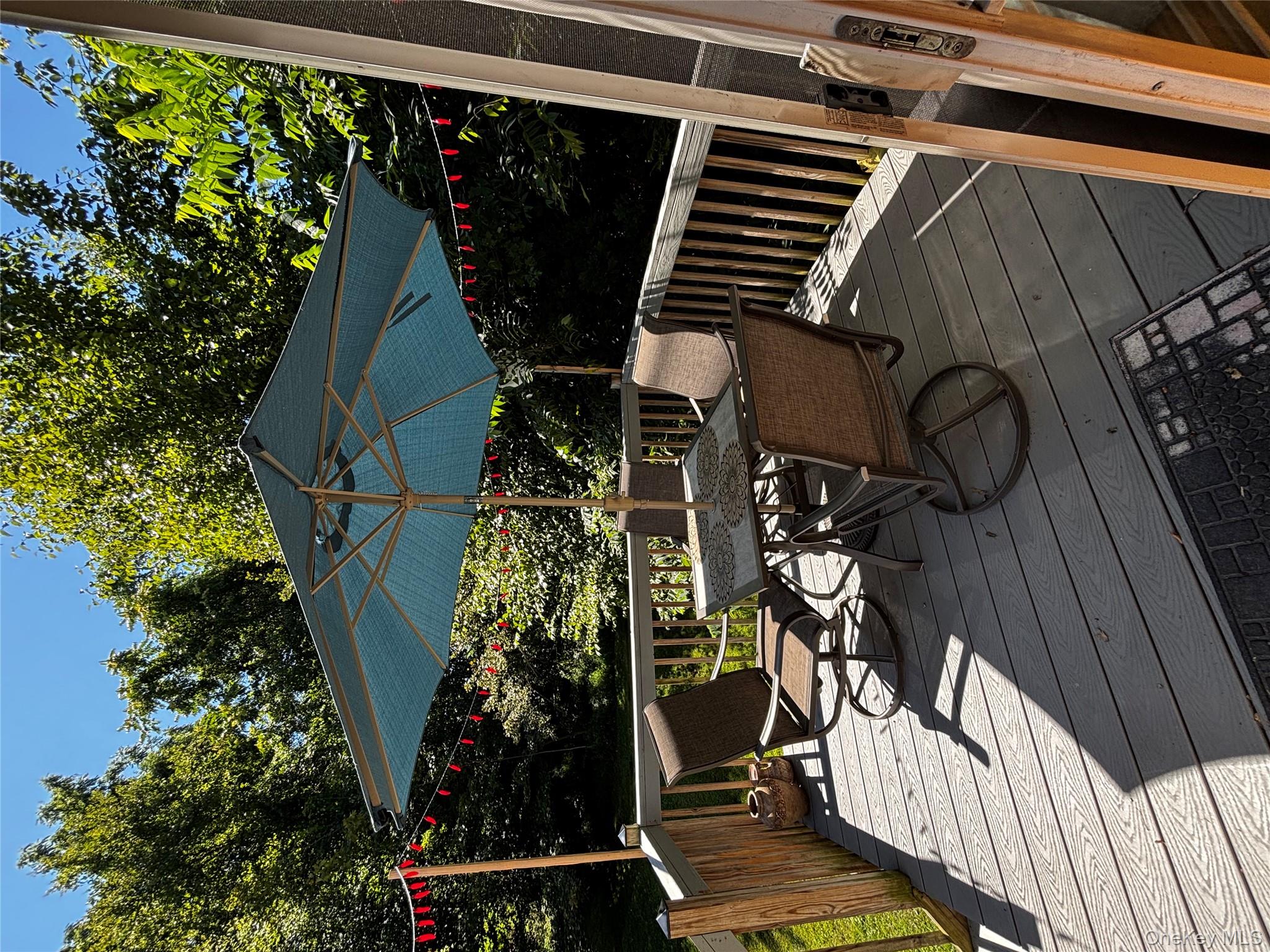 62 Triangle Of Clearwater Road Highland, NY 12528 - Photo 36 of 46 Wooden deck with outdoor dining area