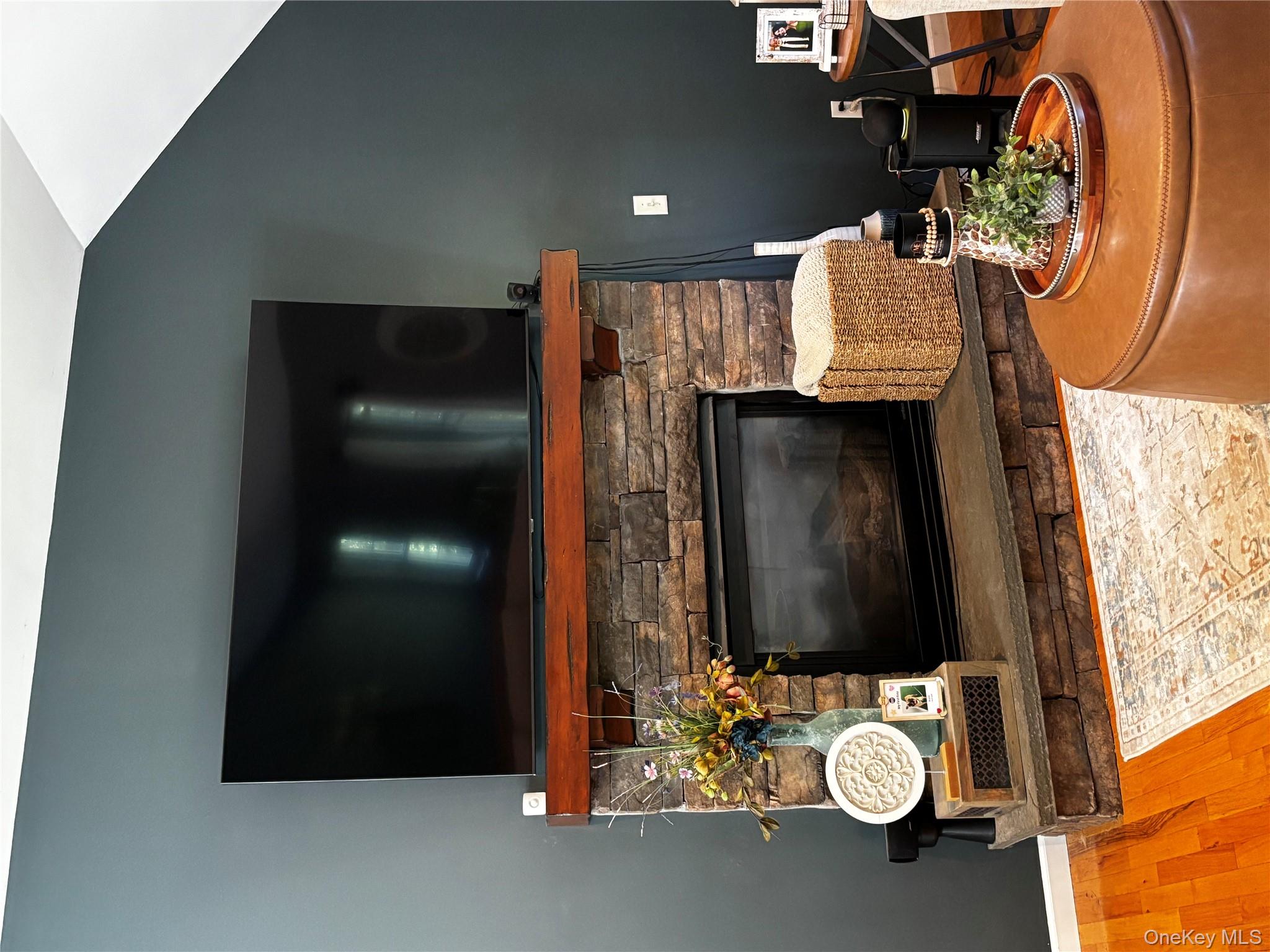 62 Triangle Of Clearwater Road Highland, NY 12528 - Photo 38 of 46 Detailed view of wood finished floors and a stone fireplace