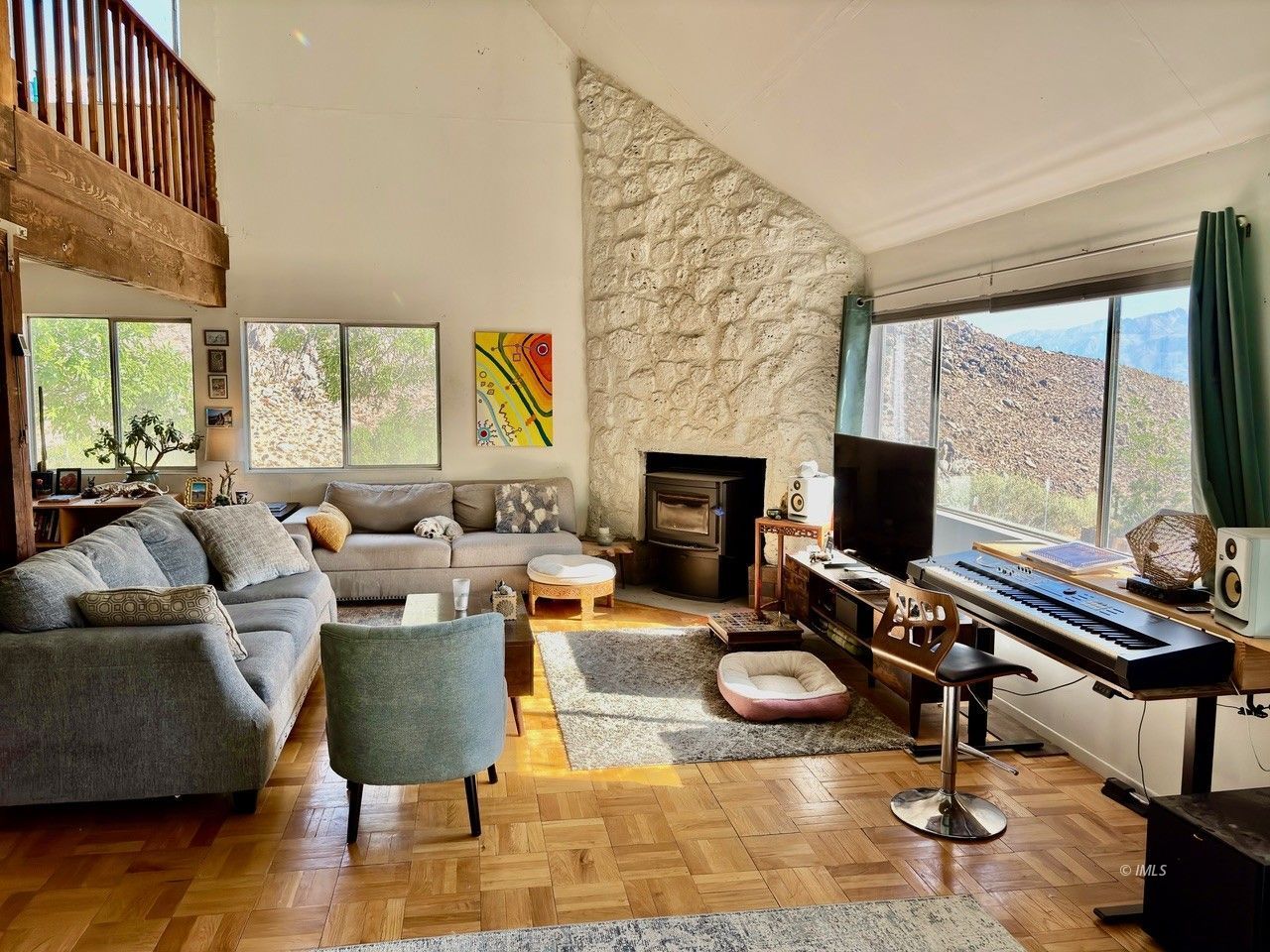 57 Bir Road Bishop, CA 93514 - Photo 3 of 35 a living room with furniture fireplace and a flat screen tv