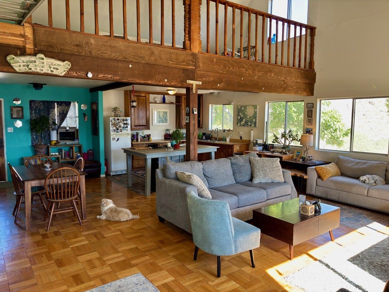 57 Bir Road Bishop, CA 93514 - Photo 4 of 35 a living room with furniture a large window and a rug