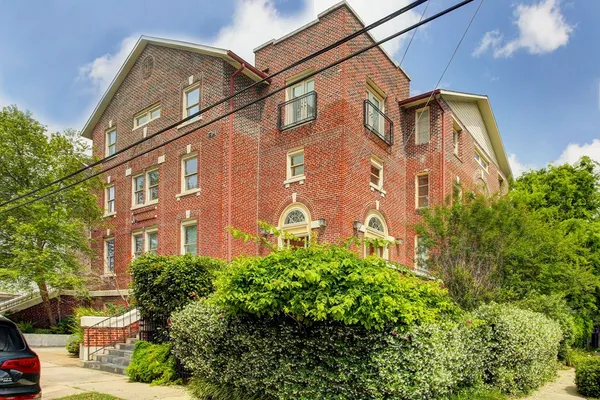 a brick building with a large windows