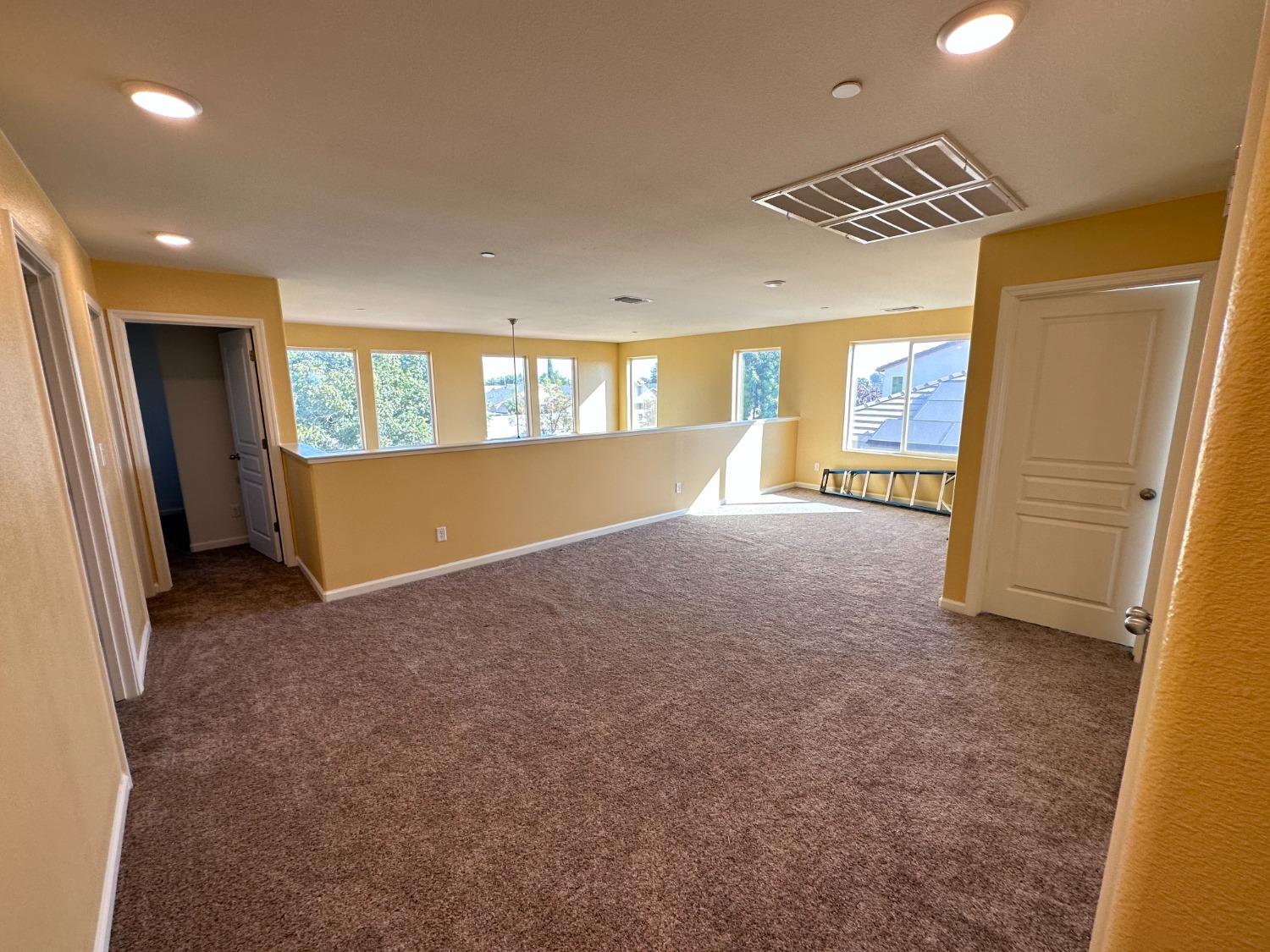 1263 Padre Street Madera, CA 93638 - Photo 18 of 26 a view of an empty room with a window