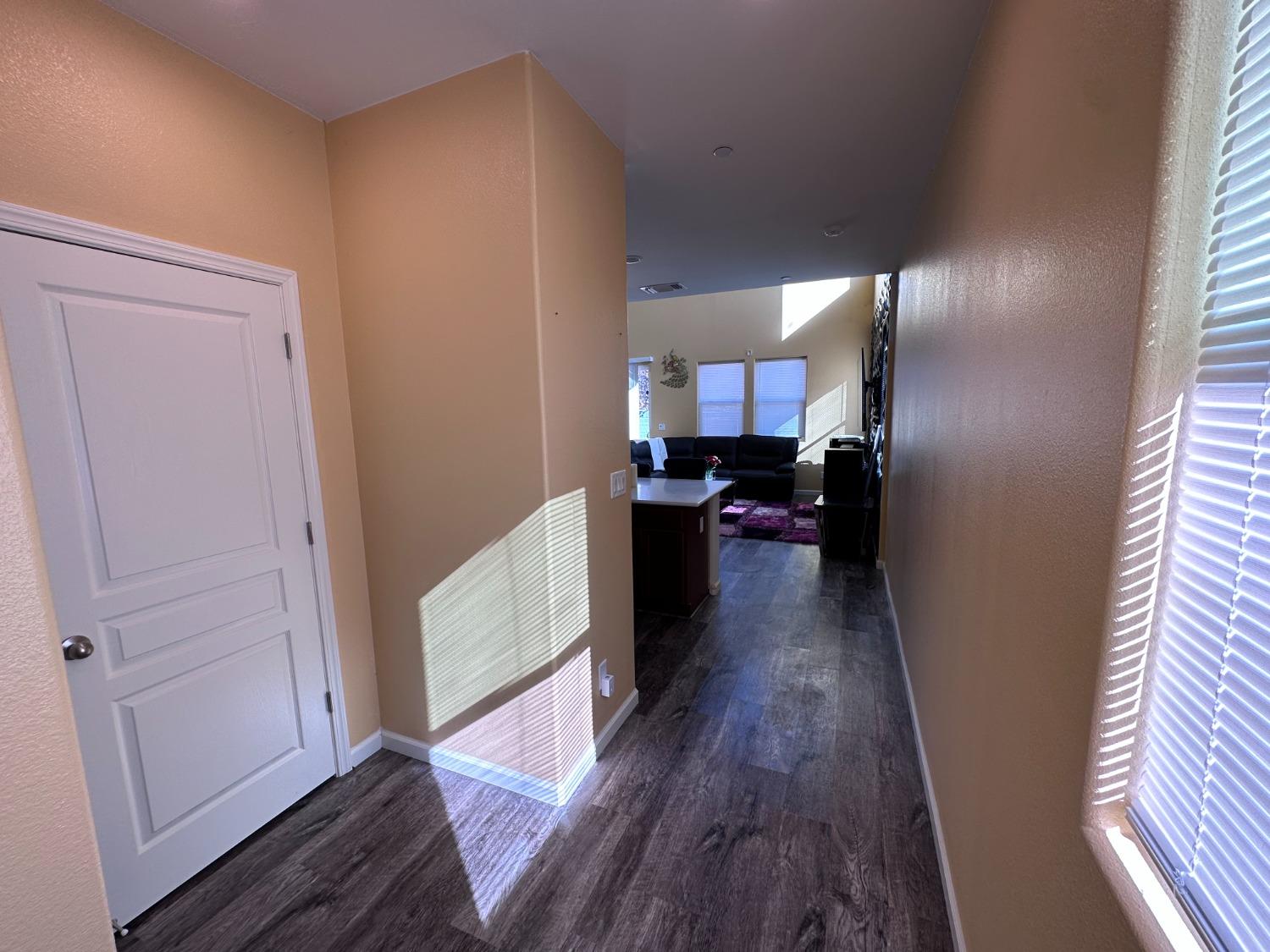 1263 Padre Street Madera, CA 93638 - Photo 4 of 26 a view of a kitchen from the hallway