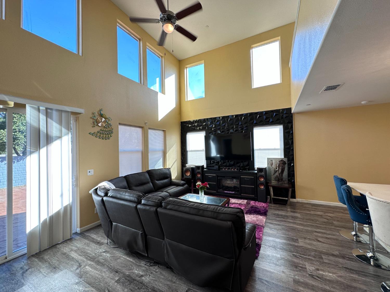 1263 Padre Street Madera, CA 93638 - Photo 9 of 26 a living room with furniture and wooden floor