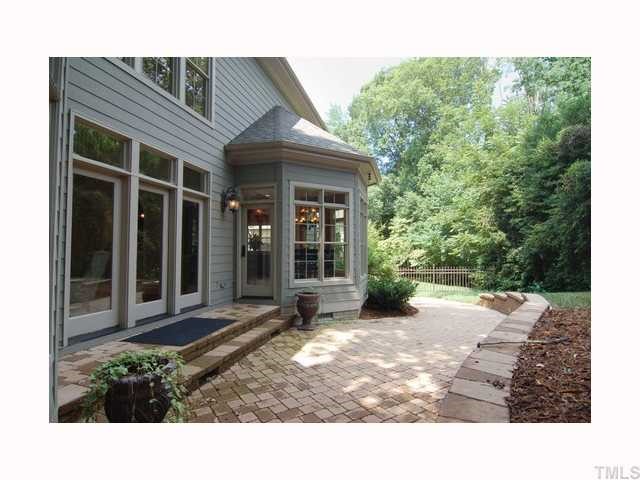 3400 Lake Boone Trail Raleigh, NC 27607 - Photo 12 of 12 a view of a backyard with chair and tables