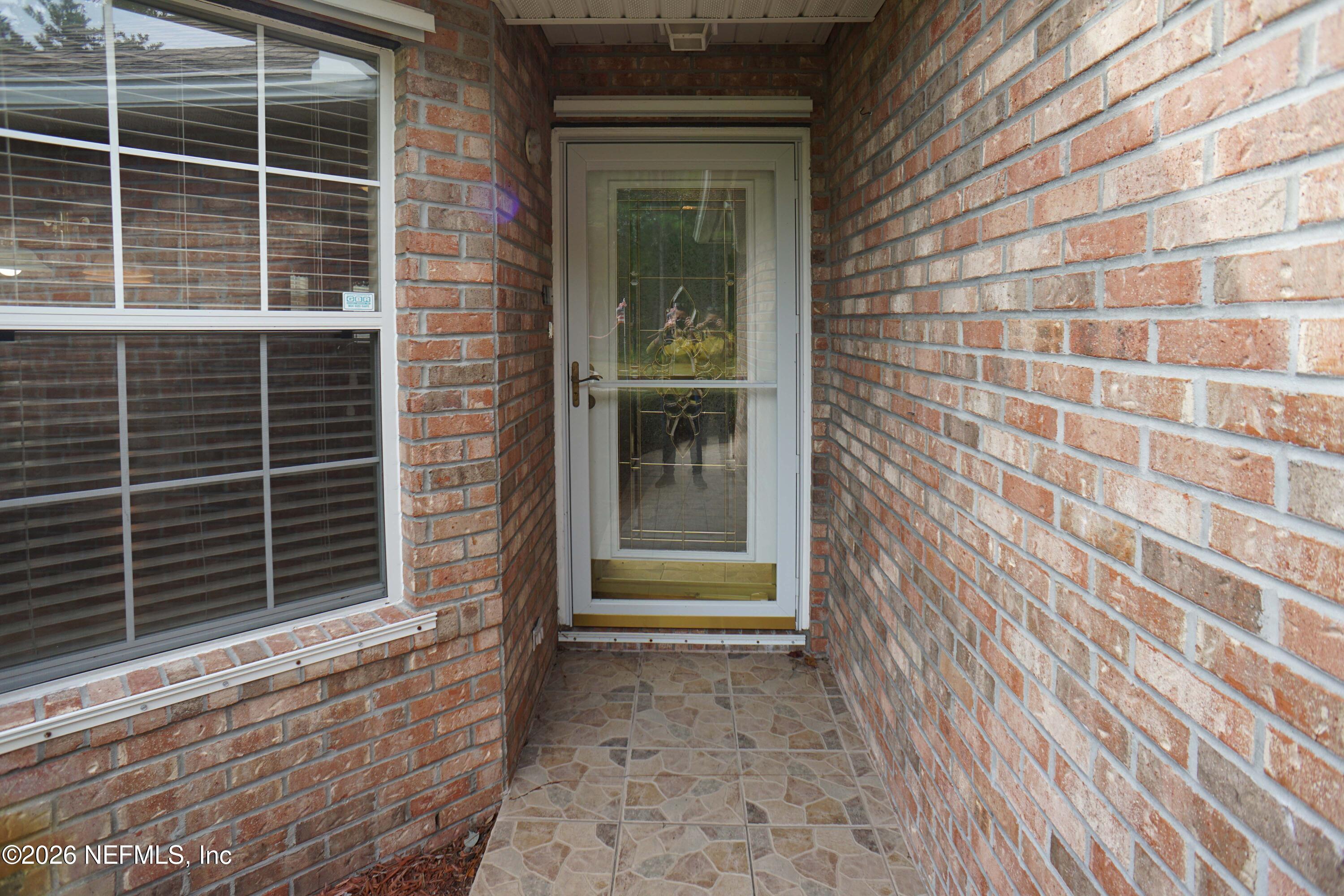 1721 Keswick Road St. Augustine, FL 32084 - Photo 2 of 17 a view of front door of house