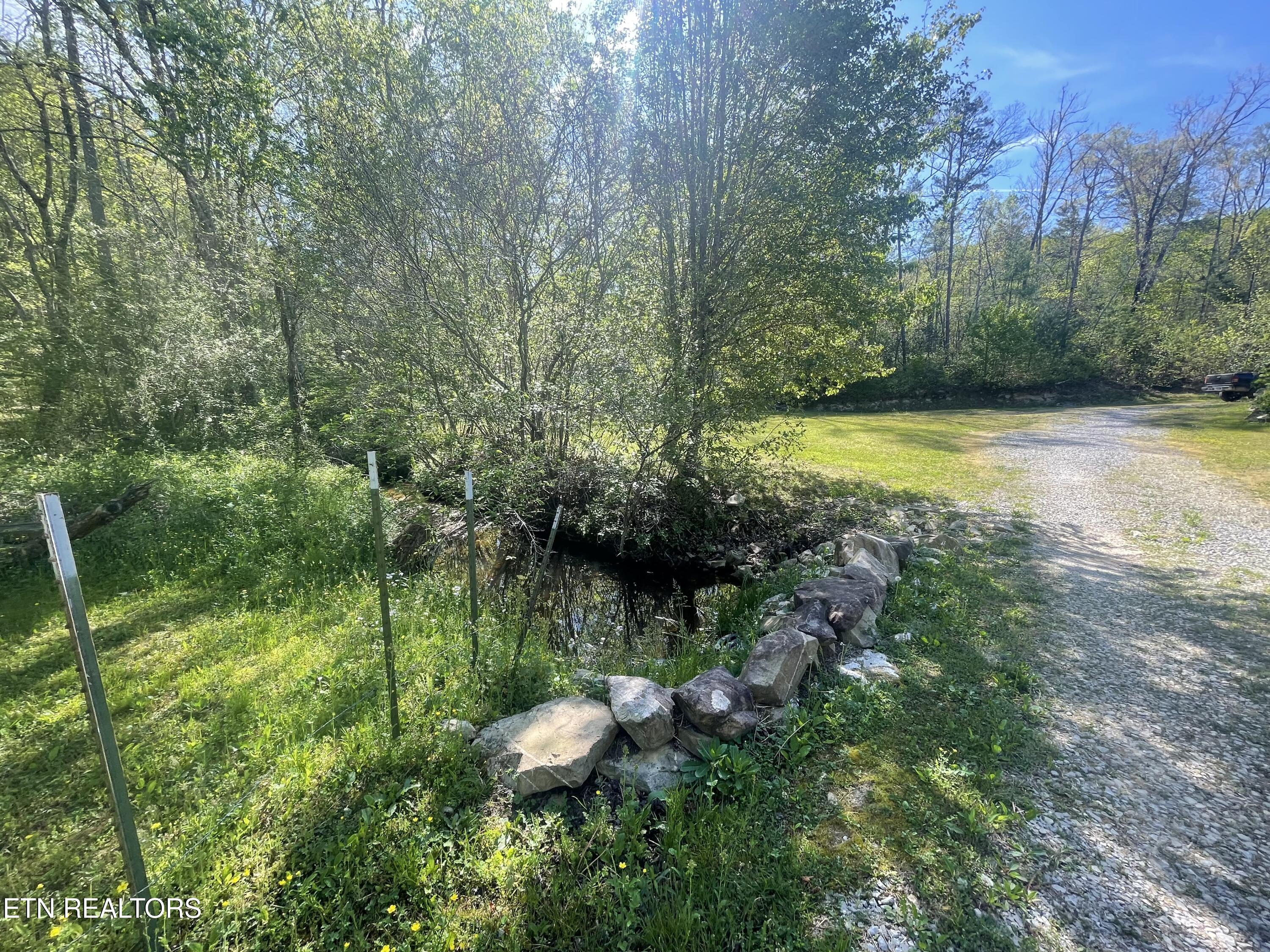 192 Massingale Road Tellico Plains, TN 37385 - Photo 29 of 36 creek entrance