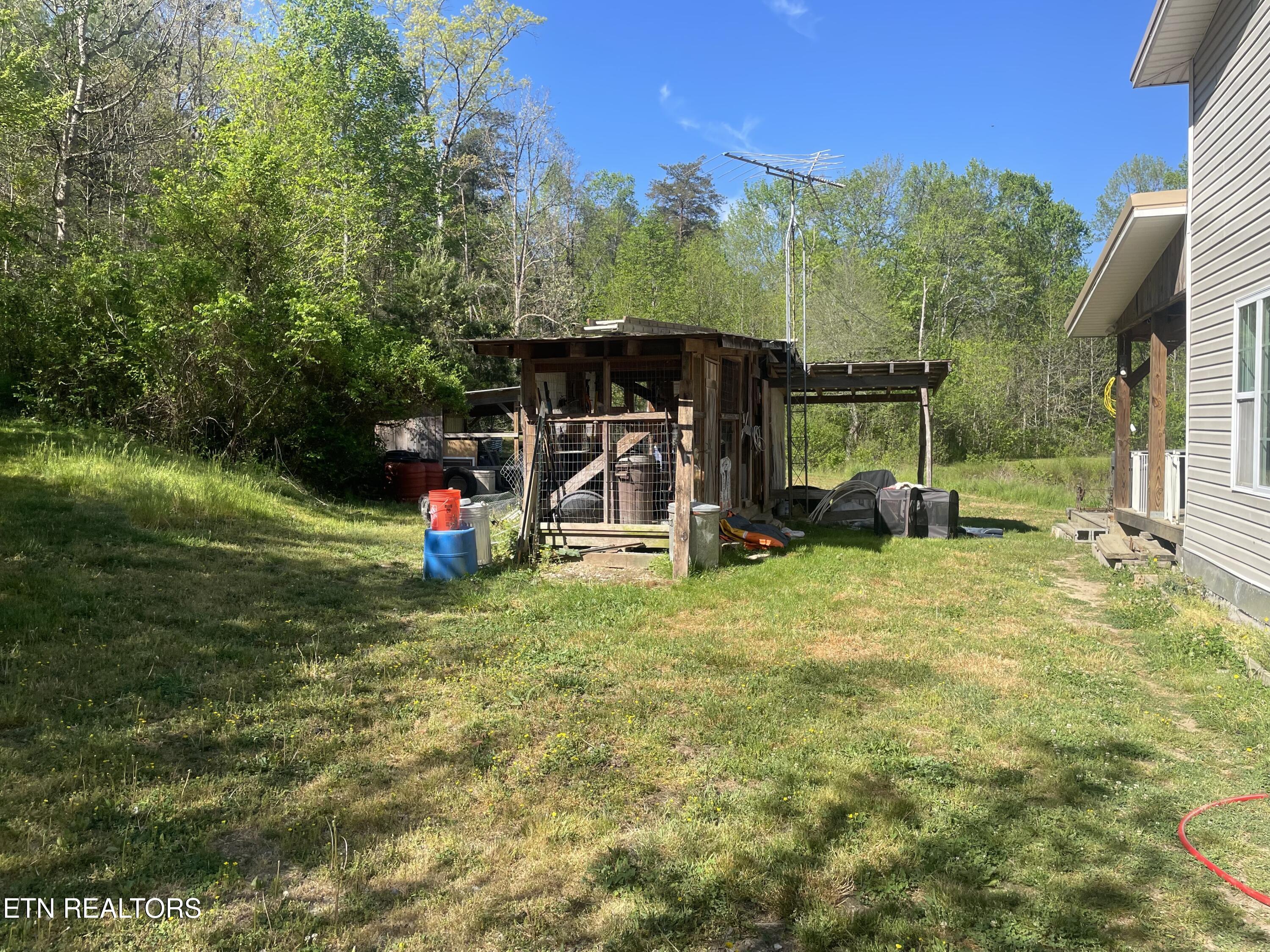 192 Massingale Road Tellico Plains, TN 37385 - Photo 32 of 36 storage shed
