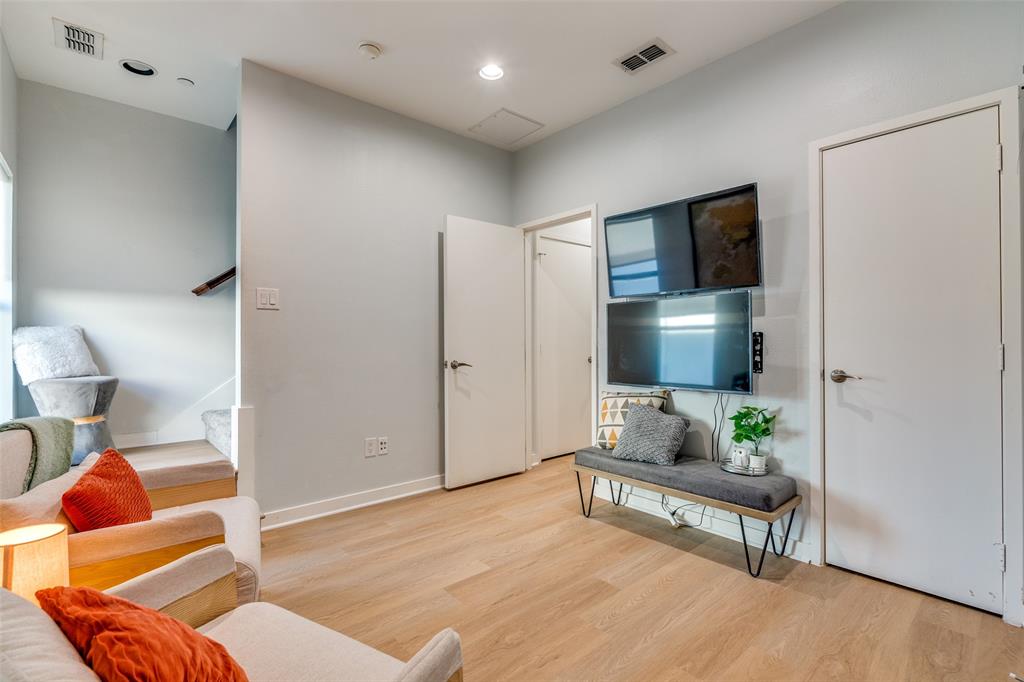 1016 Liberty Street, Unit 2 Dallas, TX 75204 - Photo 18 of 24 a living room with furniture and a flat screen tv