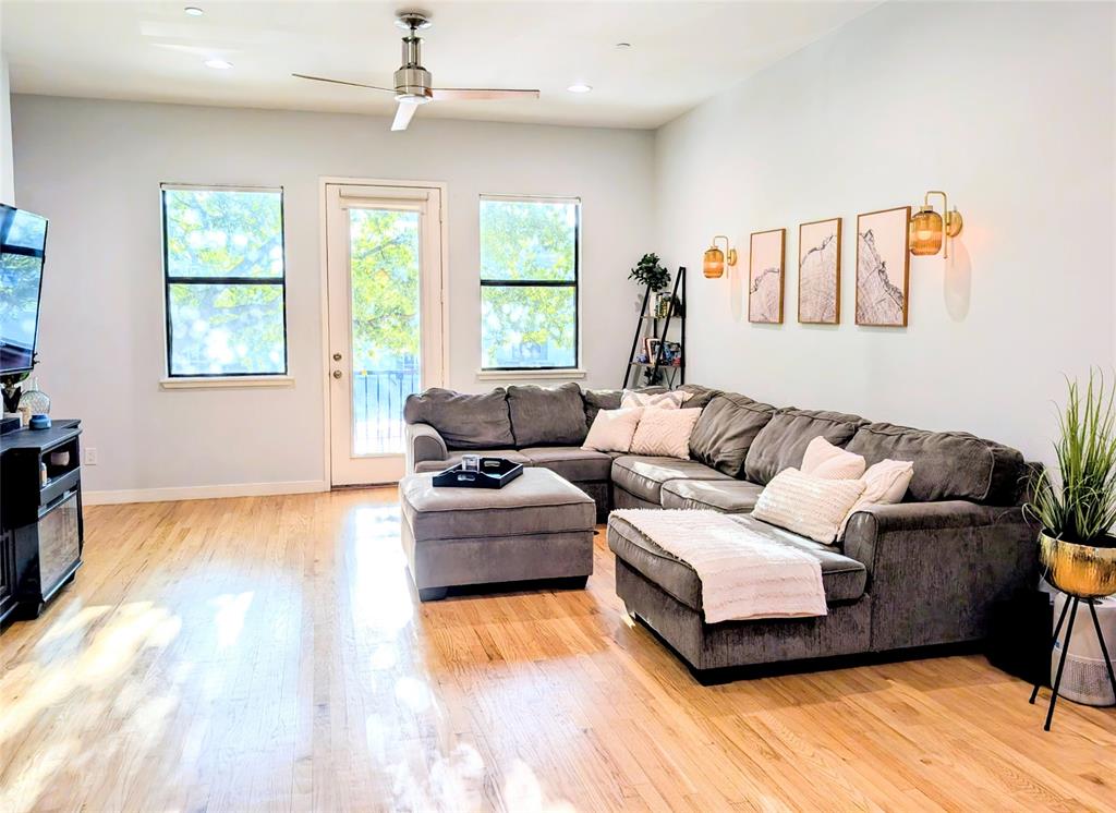 1016 Liberty Street, Unit 2 Dallas, TX 75204 - Photo 7 of 24 a living room with furniture and a flat screen tv
