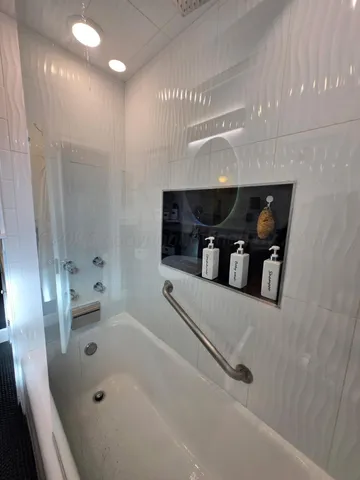 a bathroom with a bathtub