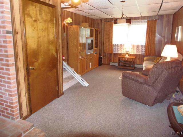 1035 Copella Road Bath, PA 18014 - Photo 26 of 47 a living room with furniture and a chandelier