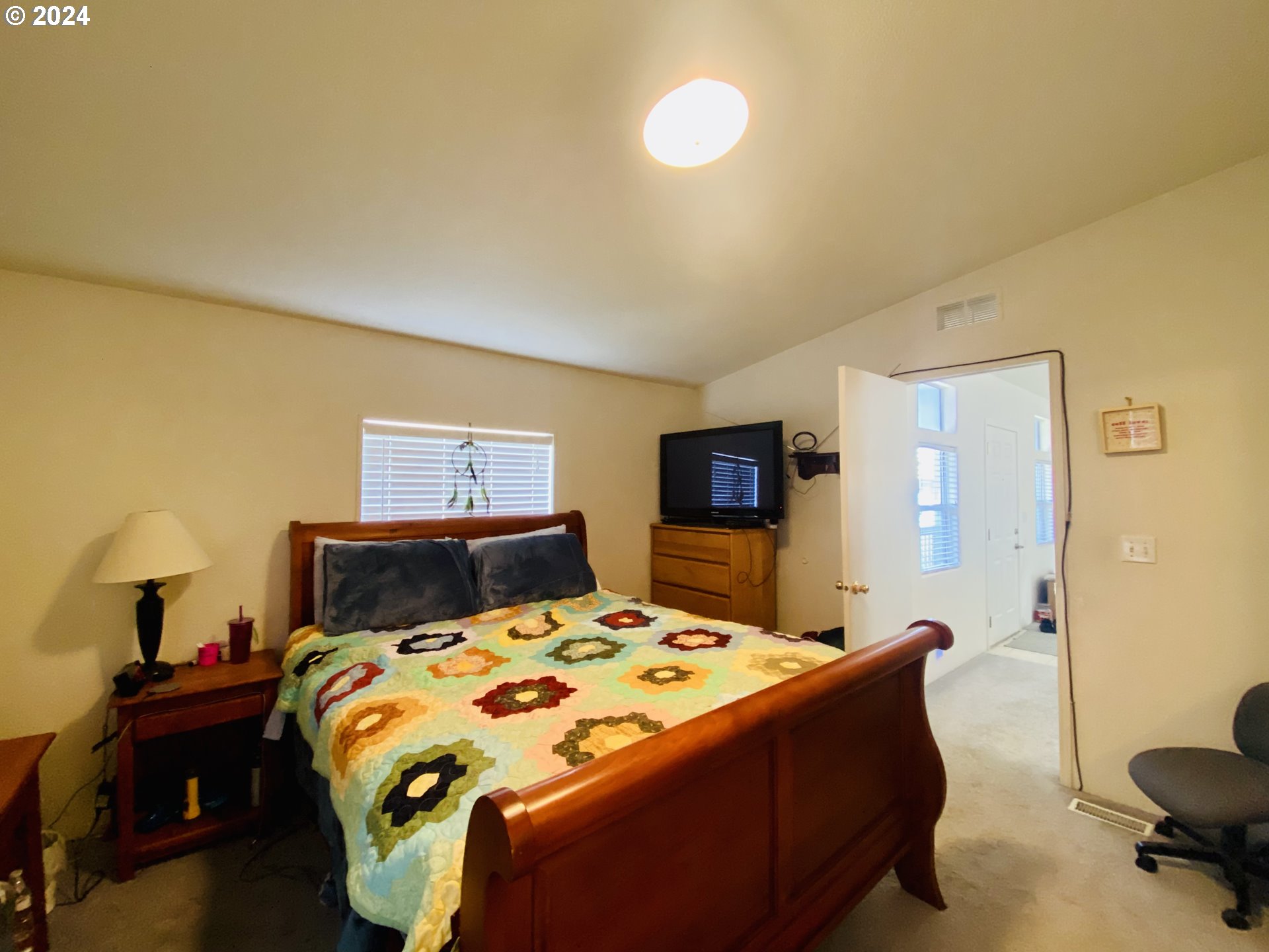 657 54th Street Springfield, OR 97478 - Photo 14 of 28 a bedroom with a bed and a couch