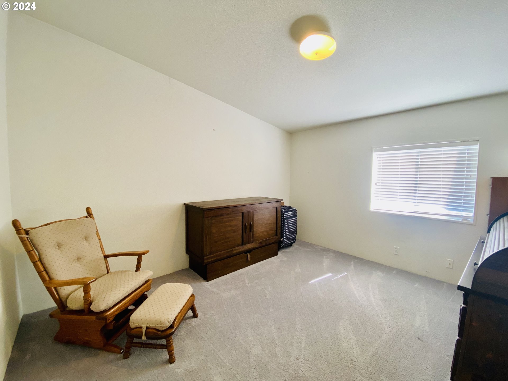 657 54th Street Springfield, OR 97478 - Photo 22 of 28 a view of a room with chairs and wooden floor