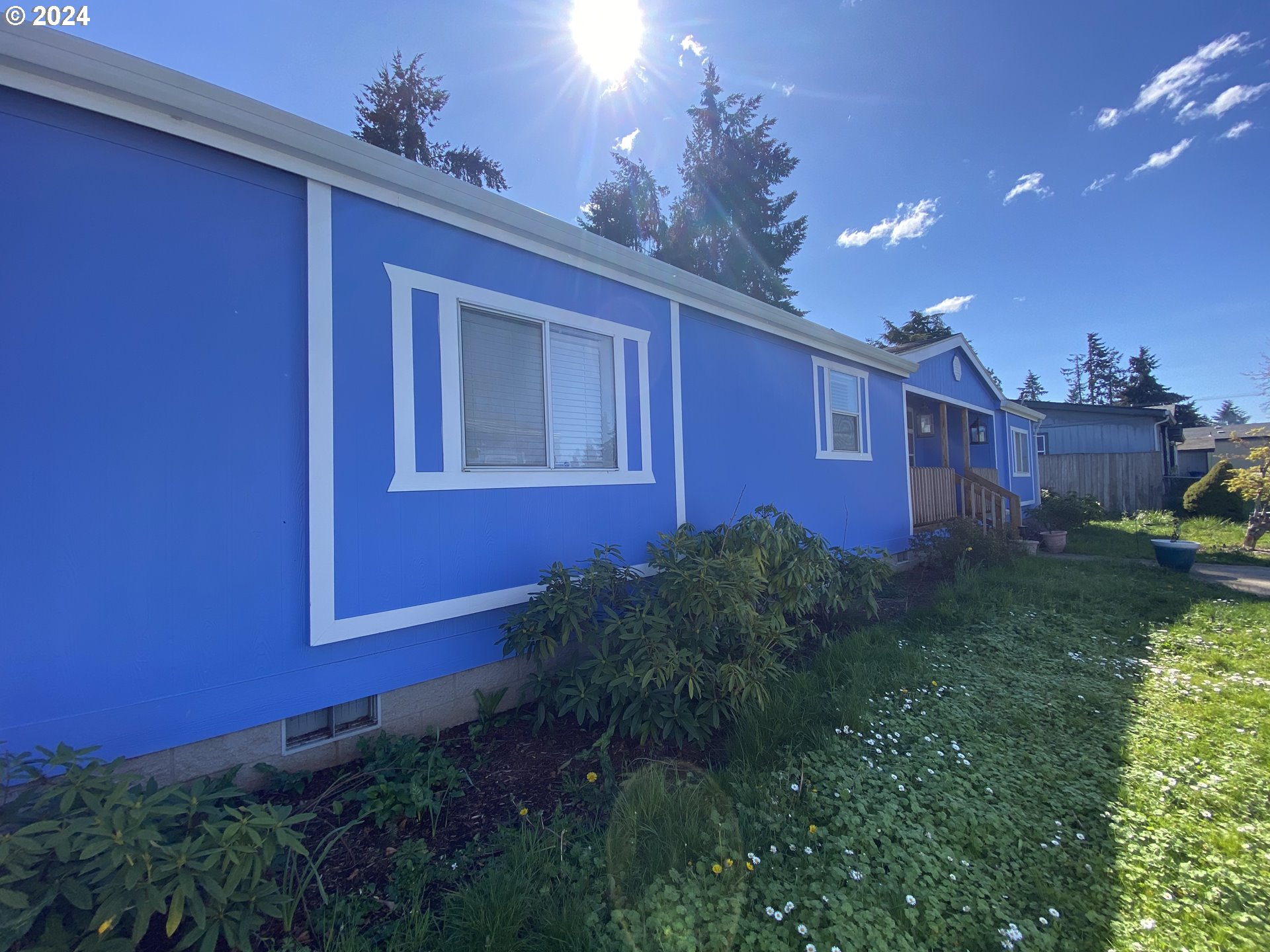 657 54th Street Springfield, OR 97478 - Photo 3 of 28 a view of a house with garden and backyard
