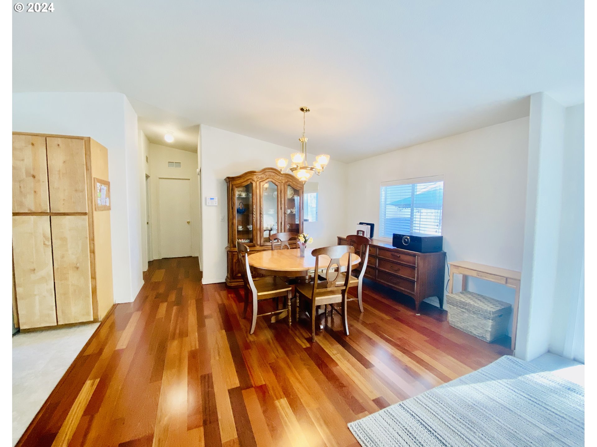 657 54th Street Springfield, OR 97478 - Photo 8 of 28 a dining room with wooden floor and window