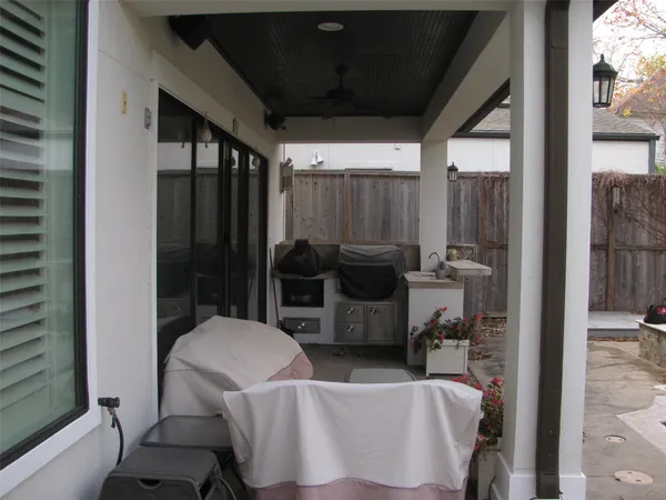 a living room with pool table and a couch
