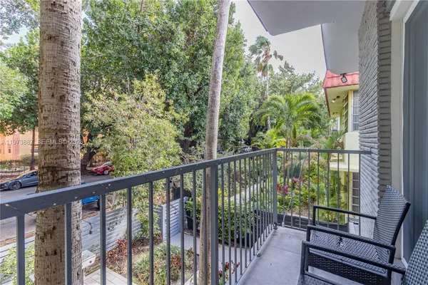 a view of a balcony with an outdoor space
