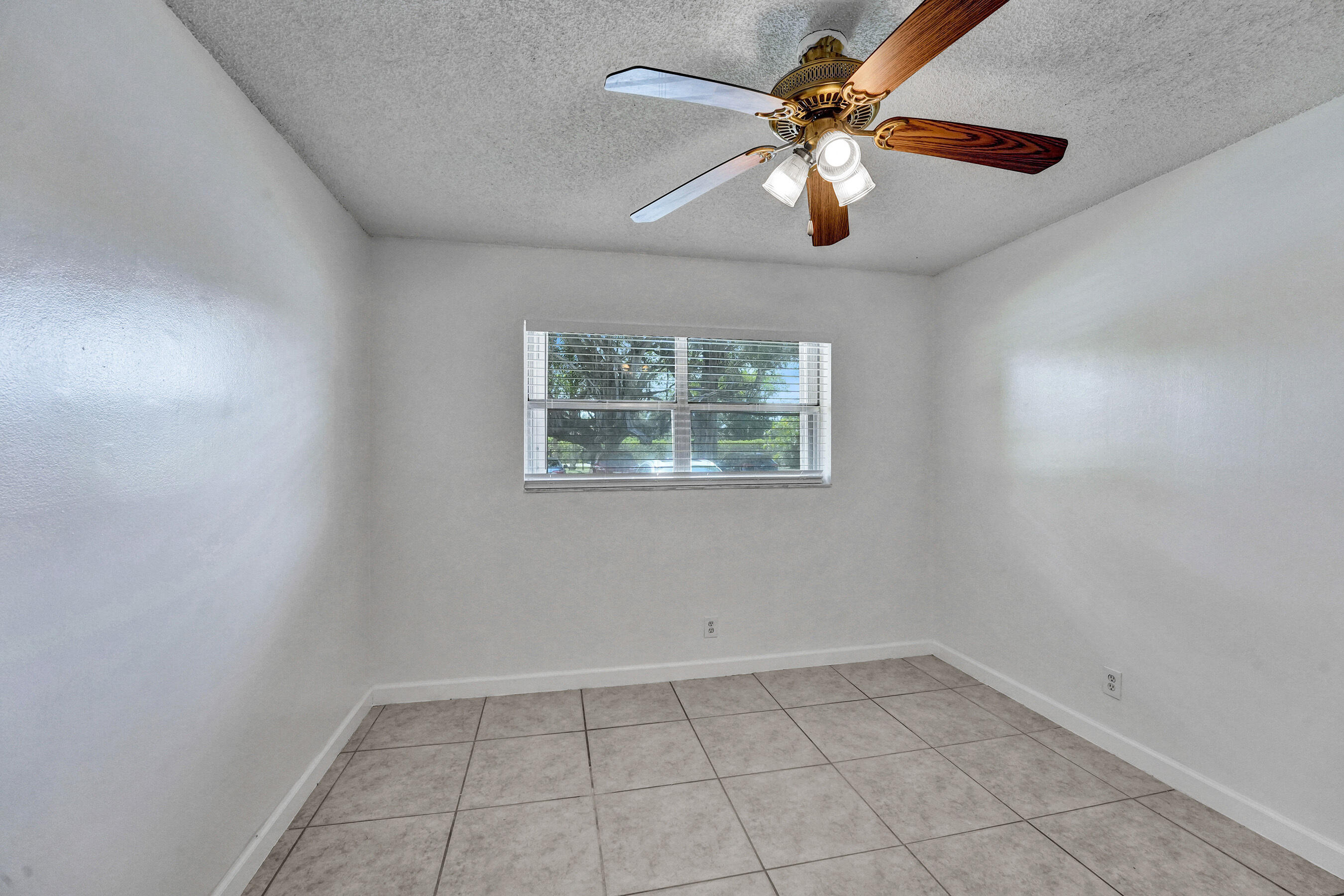600 Southeast 2nd Avenue, Unit K2 Deerfield Beach, FL 33441 - Photo 15 of 29 a view of an empty room with a window