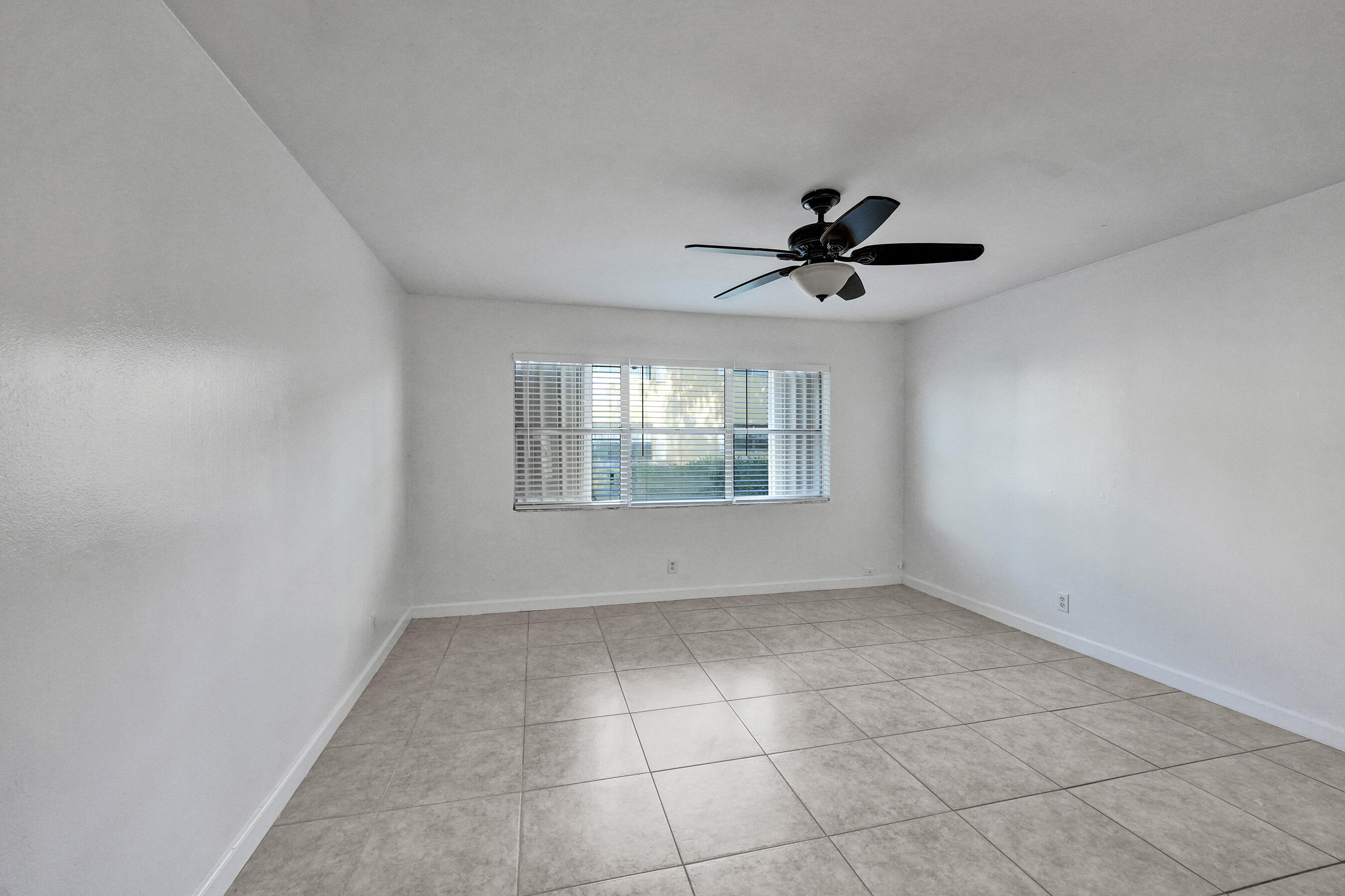 600 Southeast 2nd Avenue, Unit K2 Deerfield Beach, FL 33441 - Photo 21 of 29 a view of an empty room with a window