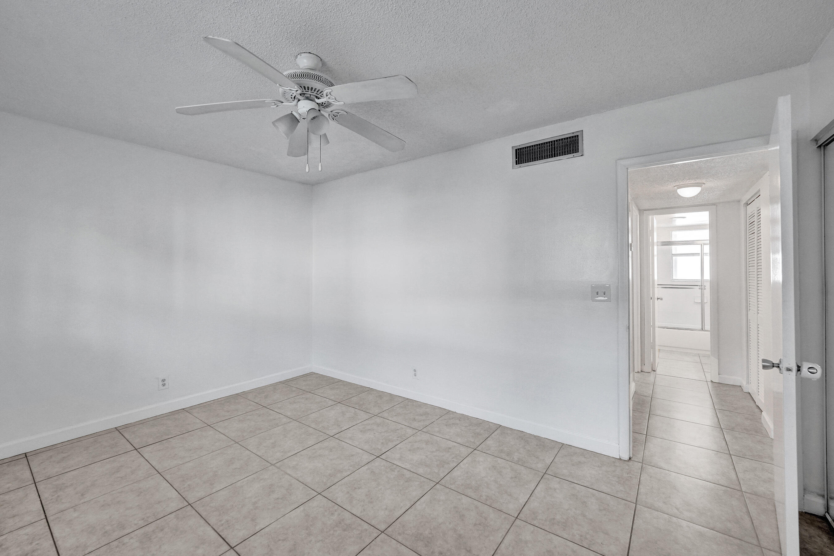 600 Southeast 2nd Avenue, Unit K2 Deerfield Beach, FL 33441 - Photo 26 of 29 wooden floor in an empty room