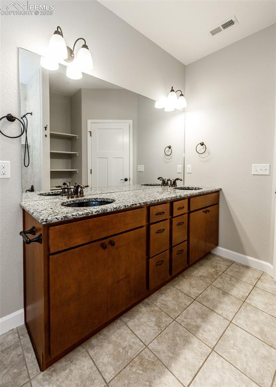 2105 Slocum Road Peyton, CO 80831 - Photo 19 of 27 Primary bath with double vanity.