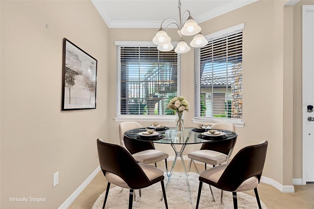 13738 Messina Loop, Unit 103 Bradenton, FL 34211 - Photo 11 of 99 a dining room with furniture and window