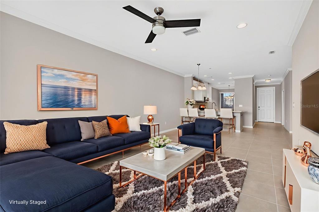 13738 Messina Loop, Unit 103 Bradenton, FL 34211 - Photo 28 of 99 a living room with furniture and a table