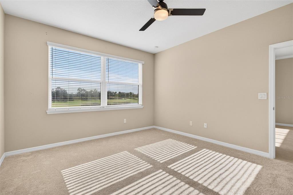 13738 Messina Loop, Unit 103 Bradenton, FL 34211 - Photo 35 of 99 a view of an empty room with a window