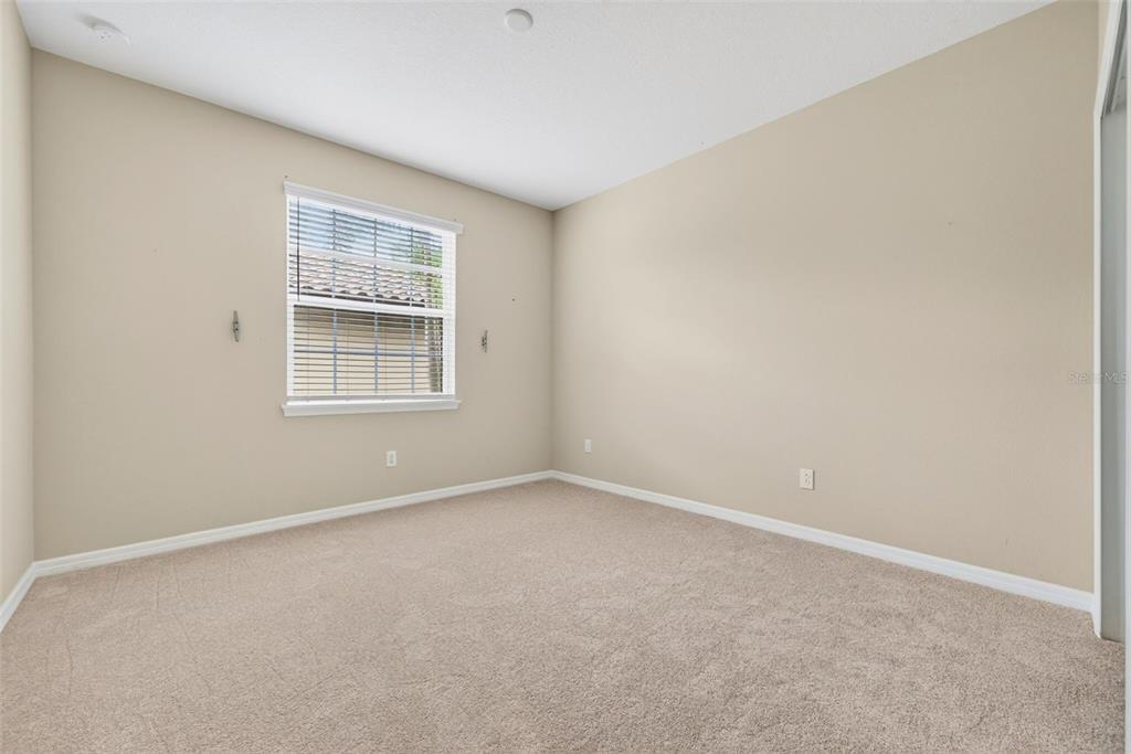 13738 Messina Loop, Unit 103 Bradenton, FL 34211 - Photo 45 of 99 an empty room with windows