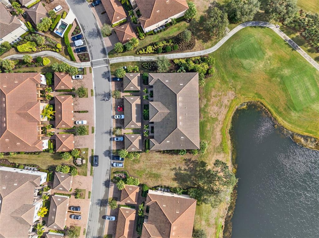 13738 Messina Loop, Unit 103 Bradenton, FL 34211 - Photo 60 of 99 an aerial view of residential house with outdoor space and swimming pool