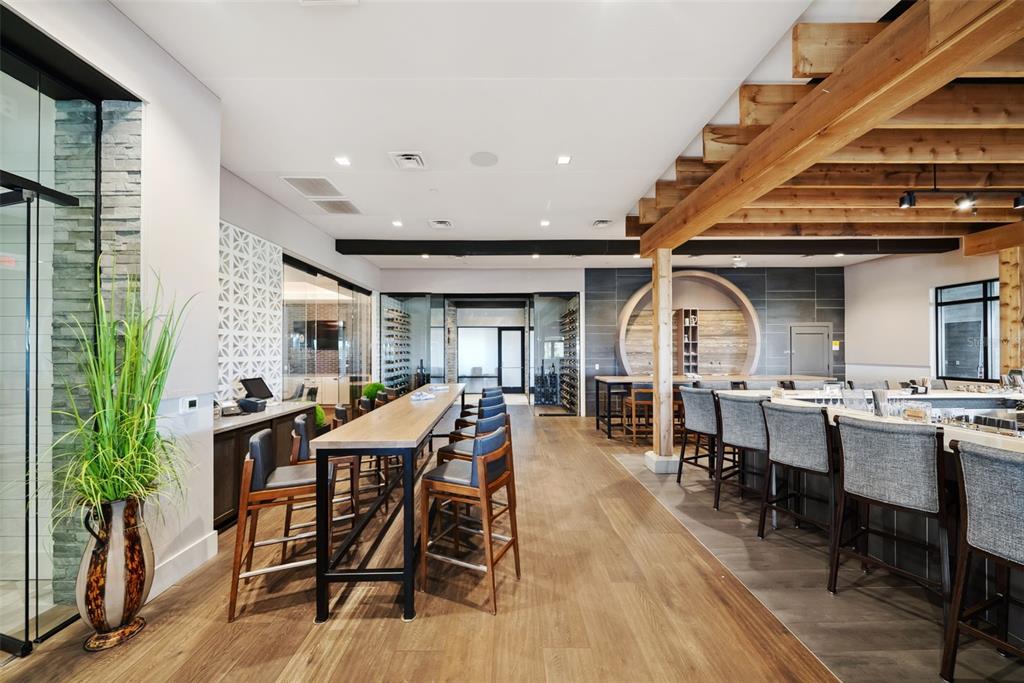 13738 Messina Loop, Unit 103 Bradenton, FL 34211 - Photo 95 of 99 a view of a dining room with furniture window and wooden floor