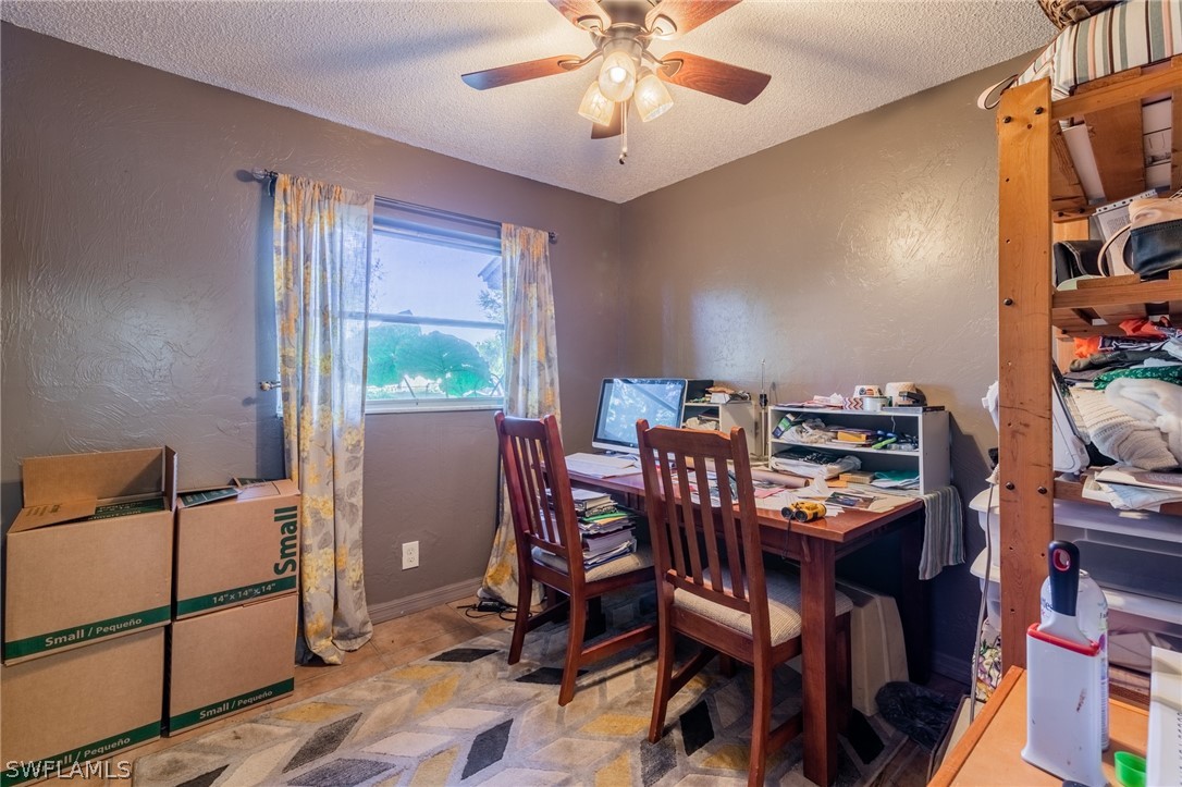 2108 Caladium Road Fort Myers, FL 33905 - Photo 15 of 30 a view of a dining room with furniture and a window