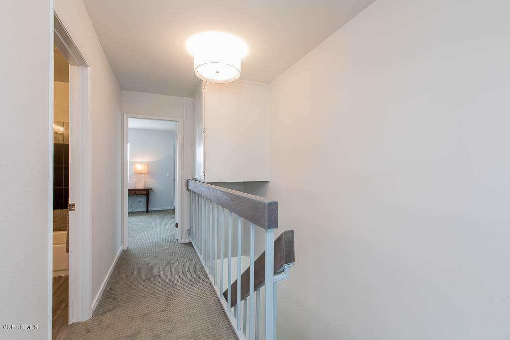 209 South Ventura Road, Unit 31 Port Hueneme, CA 93041 - Photo 12 of 41 a view of a hallway view with staircase