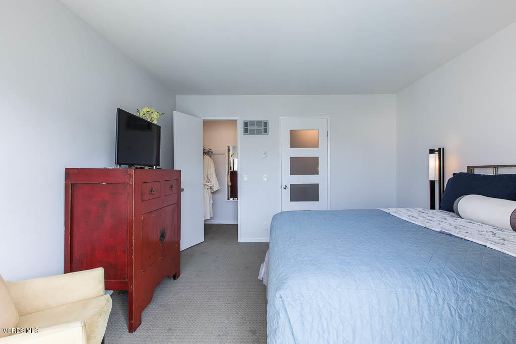 209 South Ventura Road, Unit 31 Port Hueneme, CA 93041 - Photo 13 of 41 a bedroom with a bed and a television