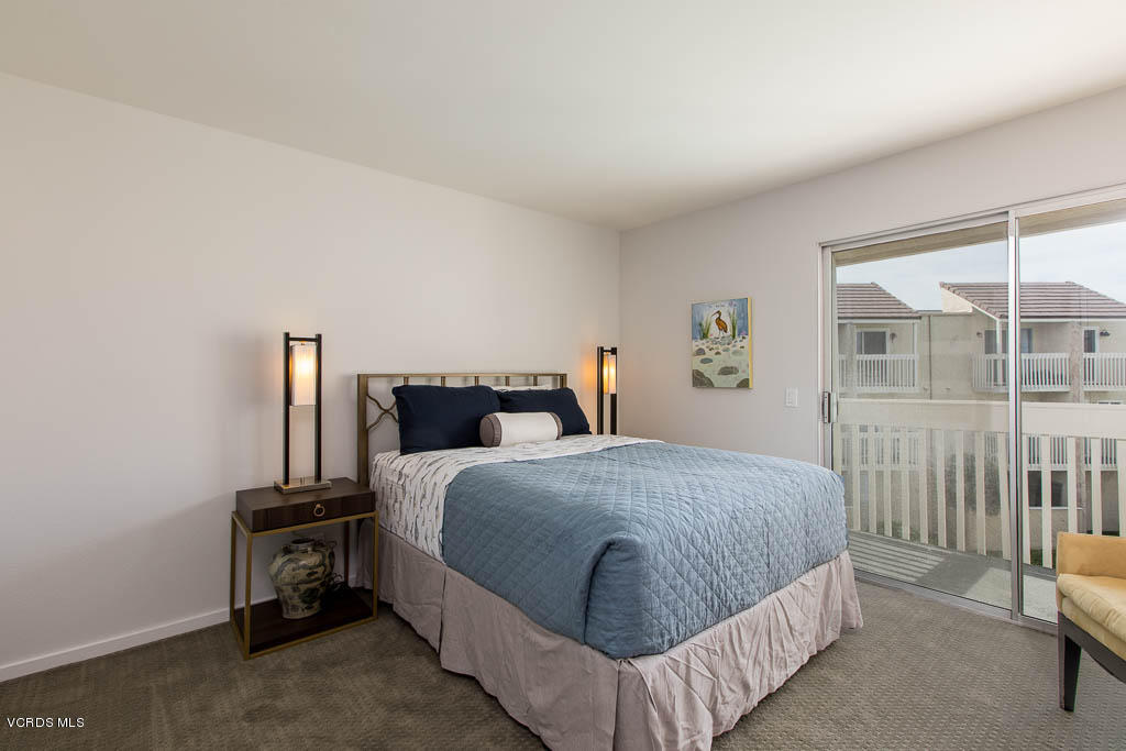 209 South Ventura Road, Unit 31 Port Hueneme, CA 93041 - Photo 14 of 41 a bedroom with a bed and a window