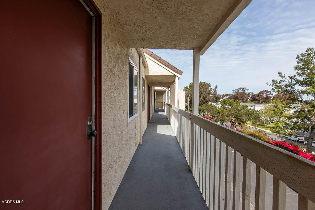 209 South Ventura Road, Unit 31 Port Hueneme, CA 93041 - Photo 39 of 41 a view of a balcony with wooden floor and city view