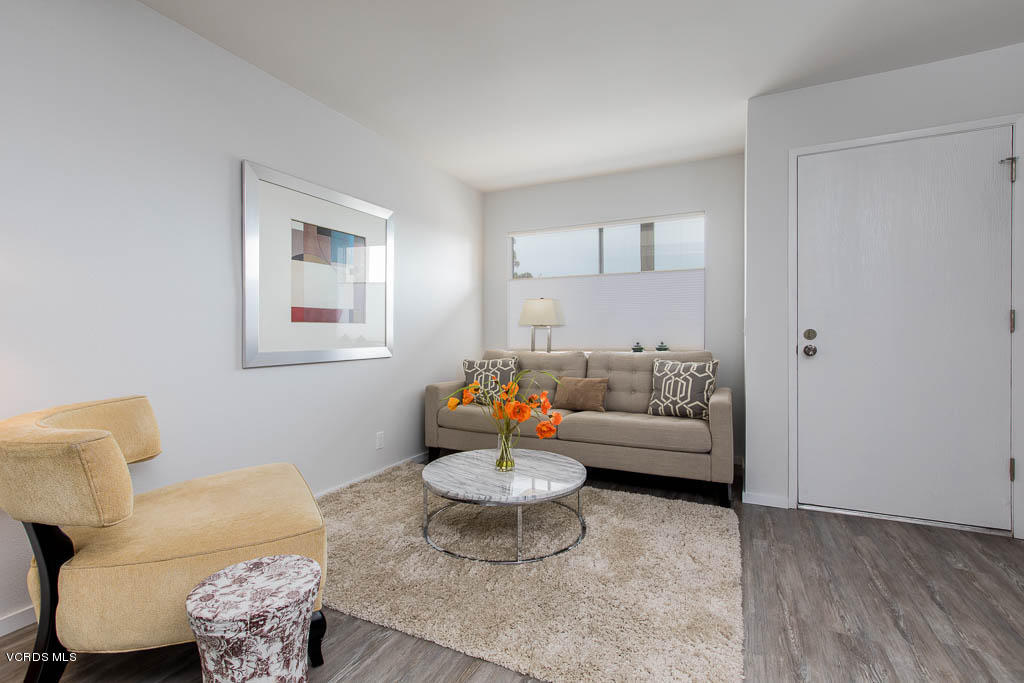 209 South Ventura Road, Unit 31 Port Hueneme, CA 93041 - Photo 6 of 41 a living room with furniture and a couch