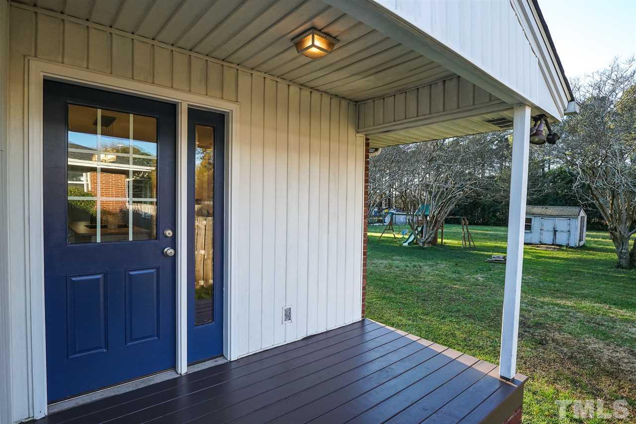 3511 Duke Homestead Road Durham, NC 27704 - Photo 17 of 19 Covered deck outside of back door.