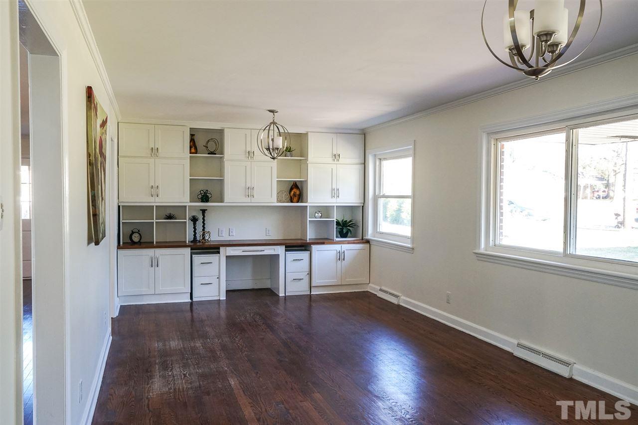 3511 Duke Homestead Road Durham, NC 27704 - Photo 4 of 19 Built in book shelves and desk.