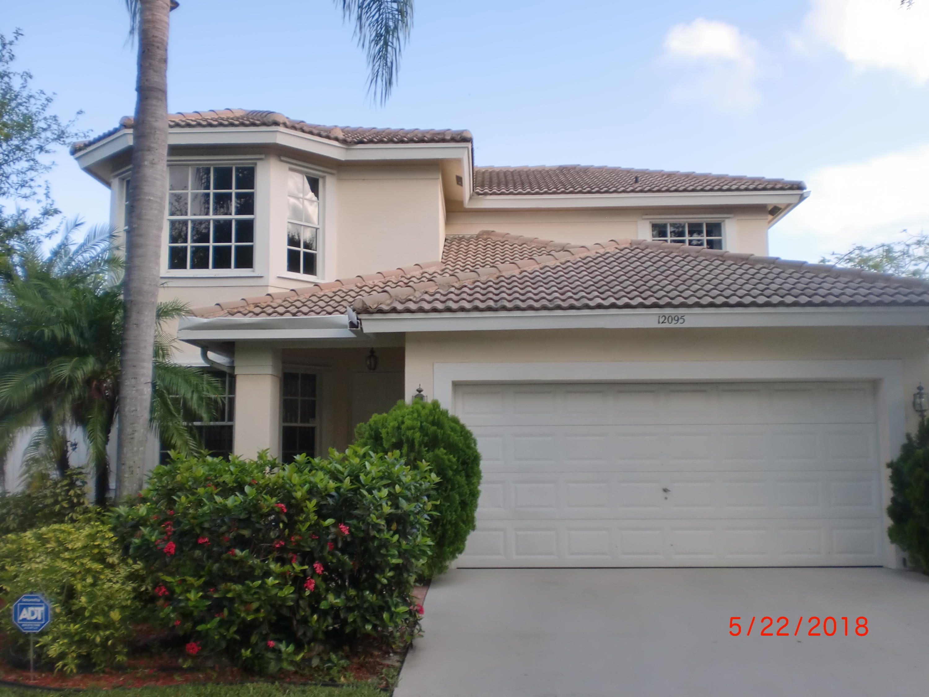 12095 Sunset Point Circle Wellington, FL 33414 - Photo 1 of 29 Front of home