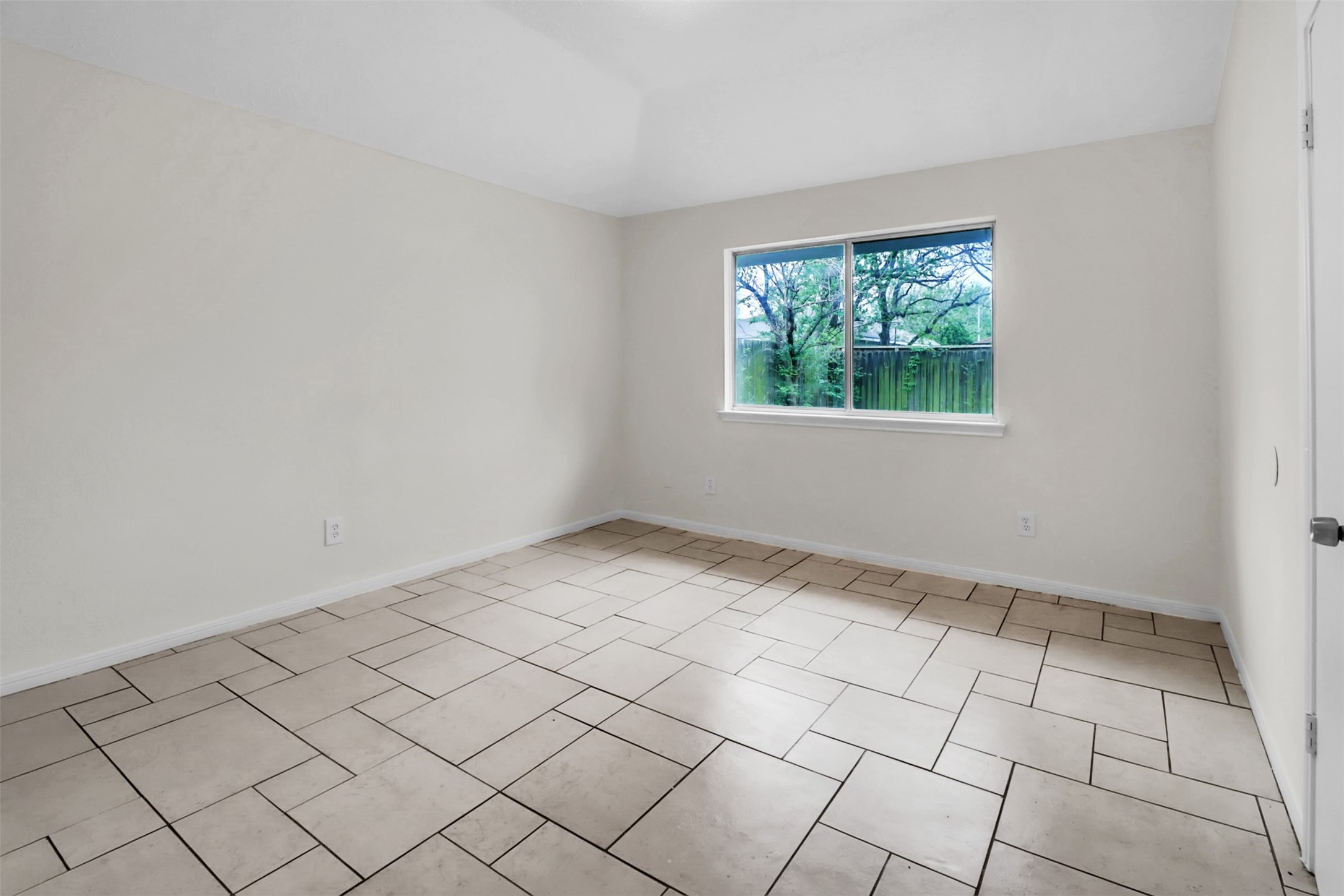 15116 Sheffield Terrace Channelview, TX 77530 - Photo 11 of 16 a view of an empty room and window