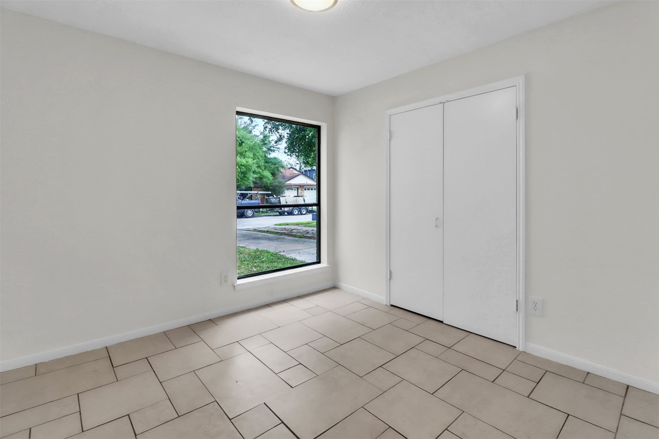 15116 Sheffield Terrace Channelview, TX 77530 - Photo 12 of 16 a view of an empty room and window