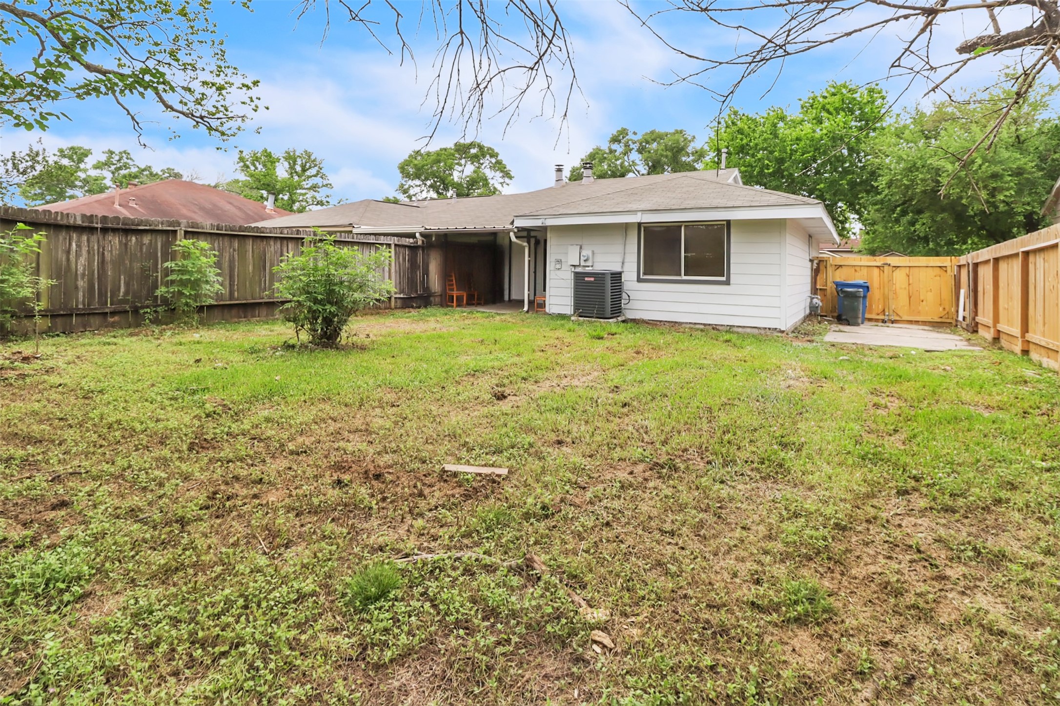 15116 Sheffield Terrace Channelview, TX 77530 - Photo 15 of 16 a front view of a house with a garden and porch