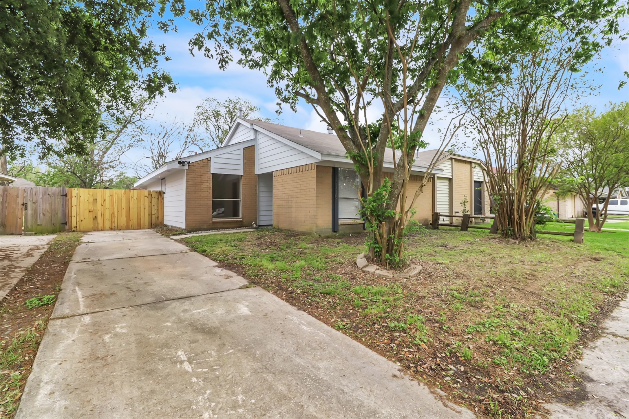15116 Sheffield Terrace Channelview, TX 77530 - Photo 2 of 16 a front view of a house with a garden