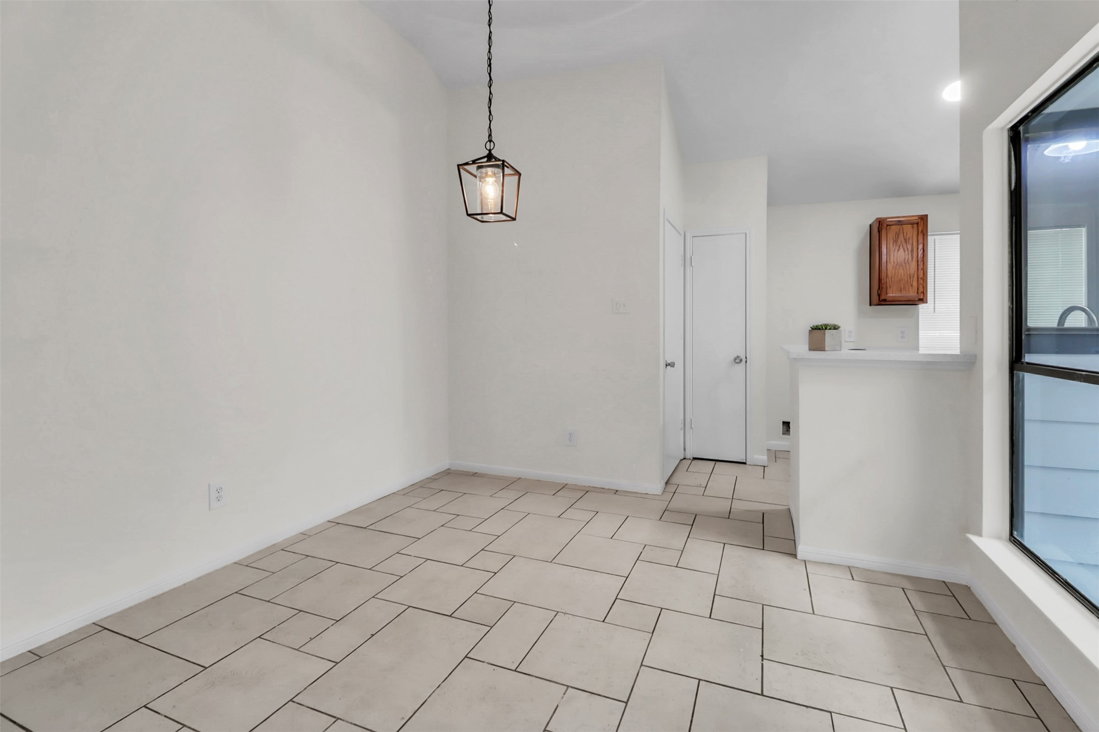 15116 Sheffield Terrace Channelview, TX 77530 - Photo 6 of 16 a view of an empty room and a window