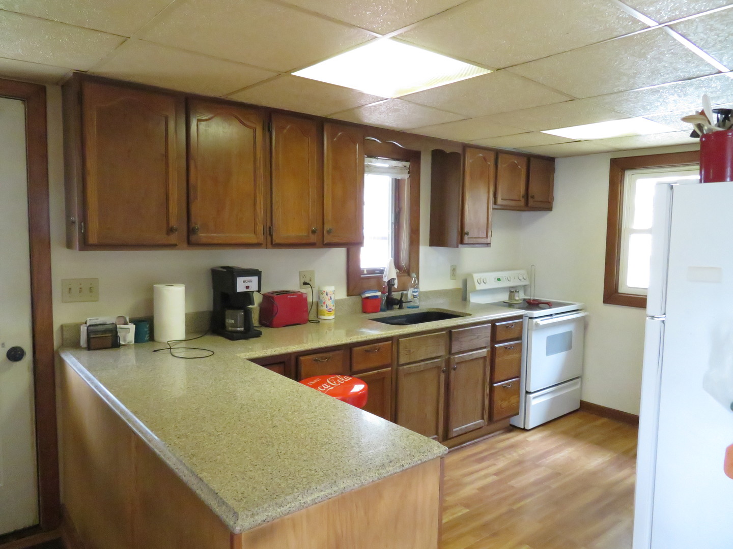 260 West Southmor Road Morris, IL 60450 - Photo 11 of 35 a kitchen with a sink a stove and cabinets