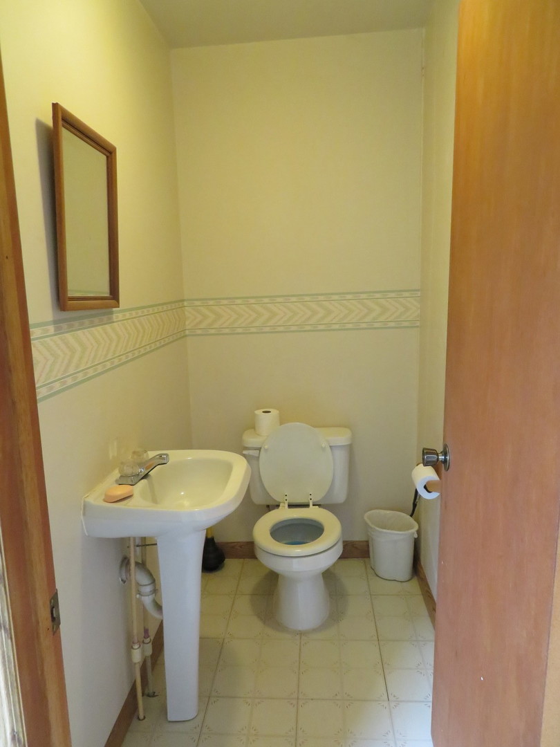 260 West Southmor Road Morris, IL 60450 - Photo 19 of 35 a bathroom with a sink and a toilet